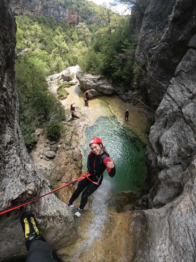 reflejos en el agua cristalina barranquismo en poyatos scaled